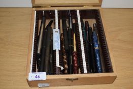 A wooden box of approx 30 fountain pens all spares and repairs