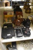 A vintage Hanimex 35SE compact camera, together with an assorted collection of other plastic