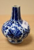 A 19th Century Chinese blue and white glazed bottle vase, decorated with stylised chrysanthemum
