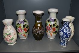 A 1970s Kingston Pottery vase, with flared rim, drip glazed design and measuring 30cm high, together