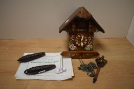 A Danbury Mint reproduction Edelweiss Cuckoo Clock, with certificate of authenticity