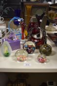 A selection of 20th Century art glass paperweights, baskets, and vases, to include a Vetro Artistico