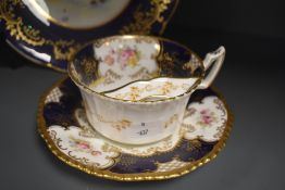 An early 20th Coalport china hand-painted Castle plate, the centre hand-painted with a scene entitl