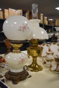 A mid-20th Century electrified Gone With The Wind Parlour lamp, measuring 50cm high, and a Victorian