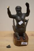 A modern armature art pottery depiction of a merman, mounted to wooden base, 24cm overall, damage to
