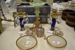 A pair of early 20th Century moulded glass pin dishes, possibly Jobling glass, within gilt metal