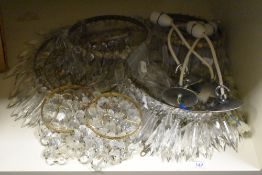 A group of mid-20th Century gilt metal and glass lustre ceiling light fittings, the largest with a