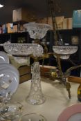 An Edwardian gilt metal and cut glass three branch table centre piece.