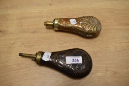 Two 19th century copper and brass powder/shot flasks, of traditional form, one embossed with