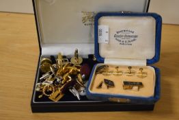 An assortment of cufflinks, tie pins and tie clips, including a cased set of Japanese cufflinks, tie