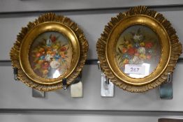 A pair of 19th Century Continental still life arrangements depicting vases of flowers, signed Jan