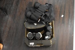 Three pairs of binoculars, Traveller 10/30x60, Prinzlux 10x50 and Prinz 10x50, all with cases.