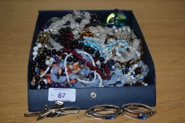 An assortment of costume jewellery, comprising various beaded jewellery including a tiger's-eye