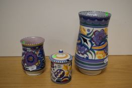A Carter Stabler Adams Poole pottery vase, a smaller Poole pottery vase and a Poole pottery preserve