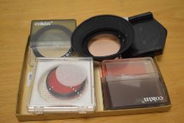 A selection of camera filters and attachments