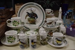 A selection of Portmeirion 'Summer Strawberries' patterned tableware, including teacups and saucers,