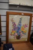 A 20th Century still life needlework embroidery, displayed within an oak frame and under glass,