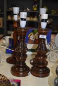 A pair of reproduction Victorian style table lamp bases, each measuring 35cm high, and another