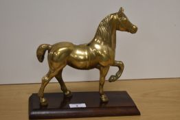 A cast-brass horse study, moulded to moulded rectangular wooden plinth 24cm