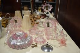 A 20th Century Continental pink frilled glass electrolier ceiling light fitting, measuring 50cm