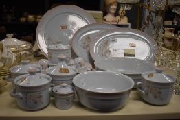 Approximately twenty one pieces of Denby 'Normandy' stoneware including three covered soup dishes