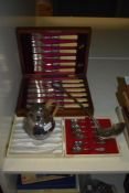 An Arts & Crafts silver plated 'Windermere Can', measuring 12cm high, a silver plated ladel in the