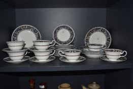 A selection of Wedgwood Blue Florentine patterned tea and tableware, to include teacups, saucers,