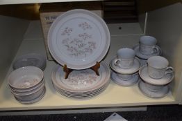 A selection of mid-20th Century Denby stoneware tableware in the 'Brittany' pattern, including