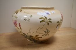 A late 19th/early 20th Century Royal Bonn jardiniere of bulbous form, hand painted with a foliate