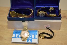 A group of wristwatches and watch faces, including Kienzle, Ingersoll, Avia and Tissot in Tissot