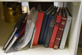 A quantity of leather bound blank stamp albums