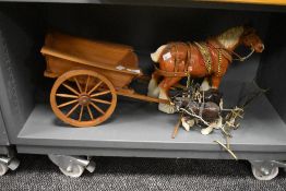 A Markay pottery shire horse study, measuring 32cm long, a wooden cart, and two smaller shire horses