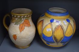 A George Clews & Co. Chameleon Ware vase, of Art Deco design, measuring 22cm high, and a Charlotte
