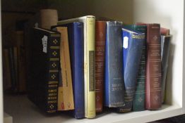 A selection of reading material including 'Popular Card Games' by Lawrence H. Dawson, Charles