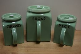 A group of three vintage Bristol Kitchen Ware handled storage jars, with covers, named Sugar,
