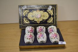 A cased set of six Royal Crown Derby porcelain egg cups, in the 'Derby Posies' pattern