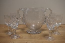 A 19th century wheel engraved and cut glass two handled vase, engraved with foliate bouquet and