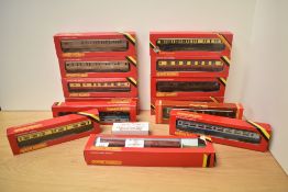 Twelve Hornby 00 Gauge Coaches along with a Hornby 00 gauge Mail Coach and a Special Edition