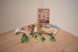 Nine Commando Magazines mainly 9p & 10p, nine Britains Military Figures on bases, International