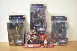 Three Neca Reel Toys Alien Vs Predator plastic figures, Hybrid x2 and Alien Warrior along with a