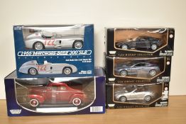 Four Motor Max Die-casts, 1:24 scale, Mercedes Benz SLK55 AMG, Aston Martin DB9 Coupe and Mercedes