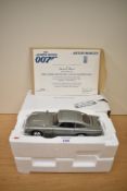 A Danbury Mint 1:24 scale Die-cast, The James Bond 007 Aston Martin DB5, in original packaging and