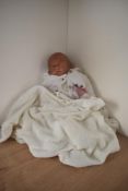 A Reborn made up Baby Doll, head marked Nines Susette, fully dressed including The Gruffalo's