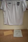 A Umbro England Replica XL Football Shirt bearing signature from Steven Gerrard, COA present
