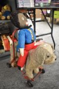A Tri-ang pushlong plush Dog on metal frame with Robertons advertising soft toy