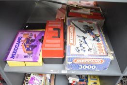 A collection of modern Meccano including 3000 part set, No 4 instructions, many parts and two yellow