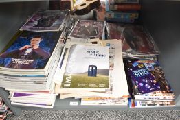 A shelf of Doctor Who Ephemera including Doctor Who Companion, Radio Times, Magazines, Activity Book
