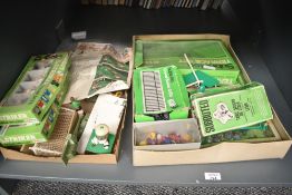 A shelf of playworn Subbuteo including part teams and many boxes