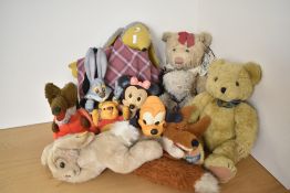 A shelf of Soft and Rubber Bears and Figures including Bendy Winnie The Pooh, Pluto, Minnie Mouse