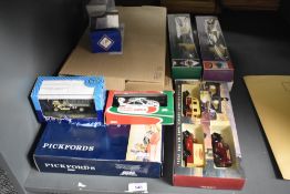 A shelf of Lledo and similar Die-casts including Pickfords, Pro Movers, British Rail boxed sets,